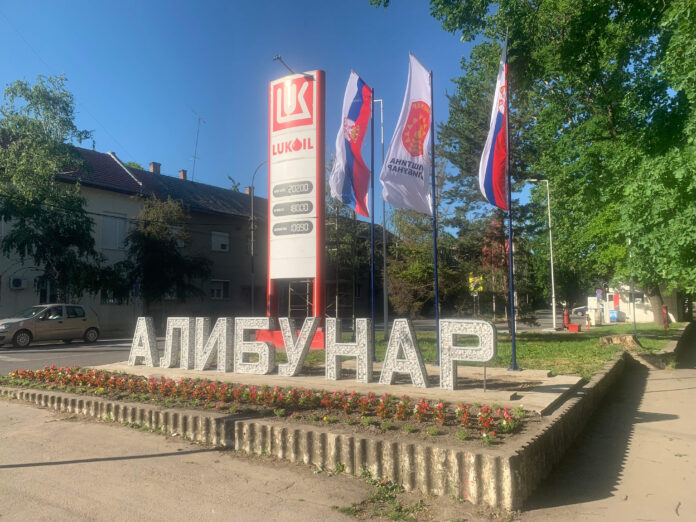 али
